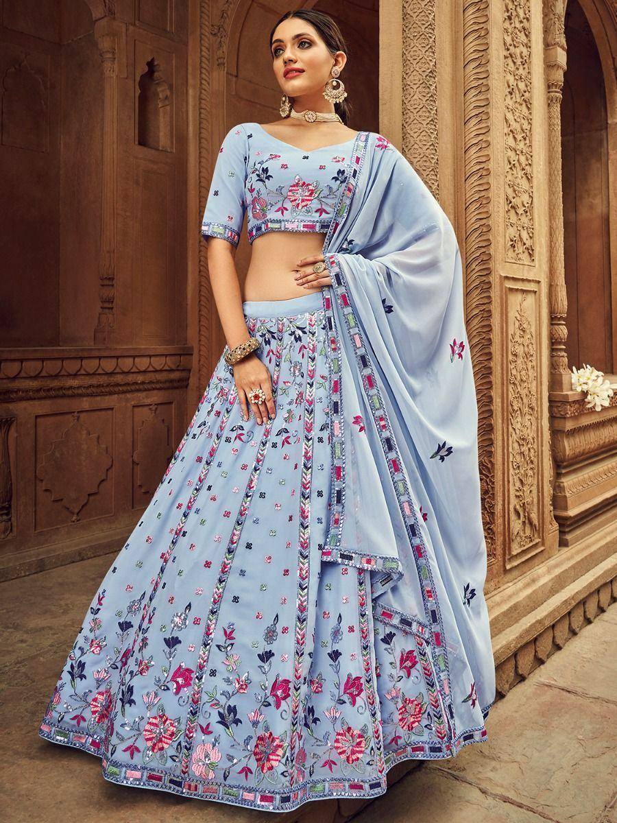 Light blue embroidered lehenga choli with floral motifs, perfect for Indian ethnic occasions
