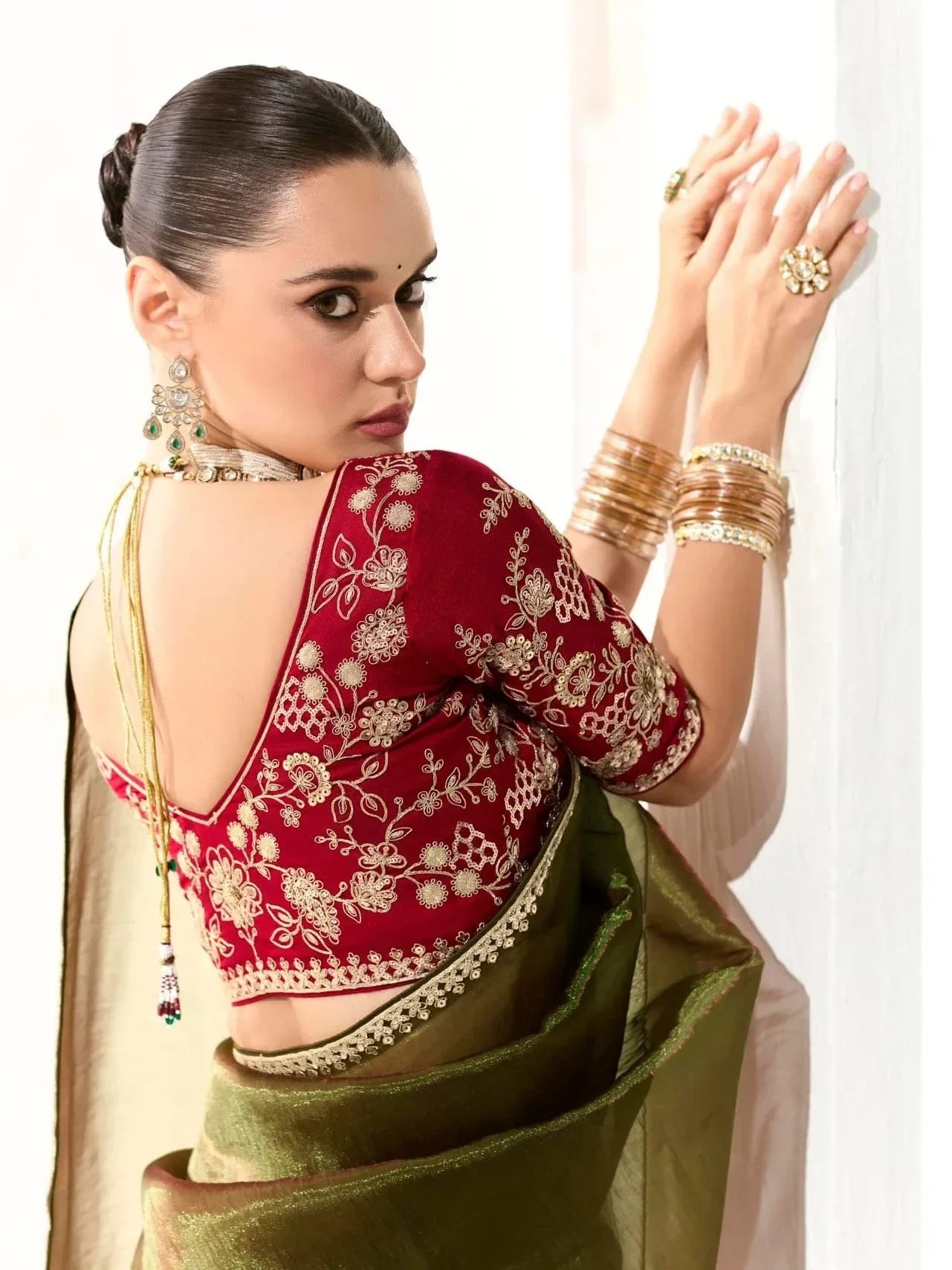 Incredible Olive Green Sequins Tissue Silk Saree With Maroon Blouse
