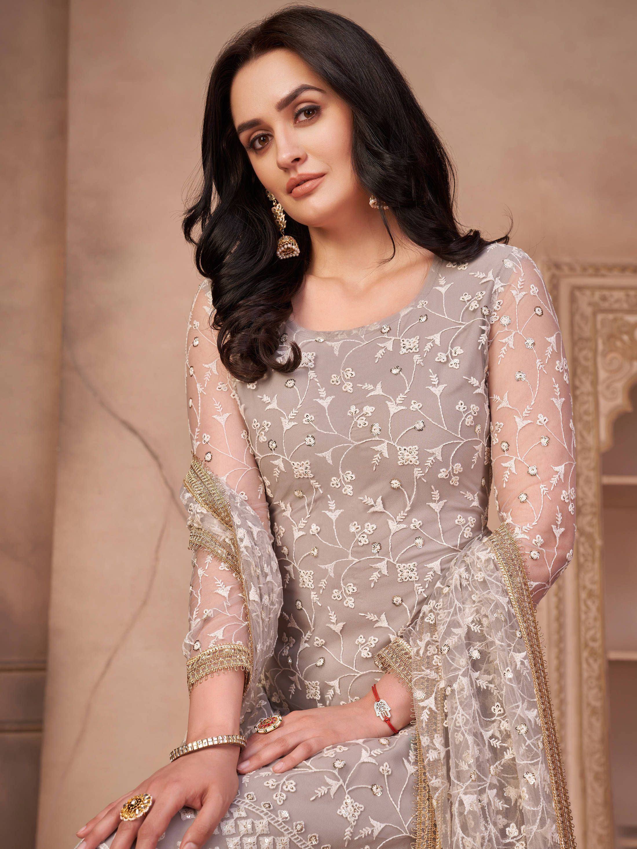 Elegant grey embroidered salwar kameez with sheer sleeves and gold detailing, perfect for Indian ethnic wear.