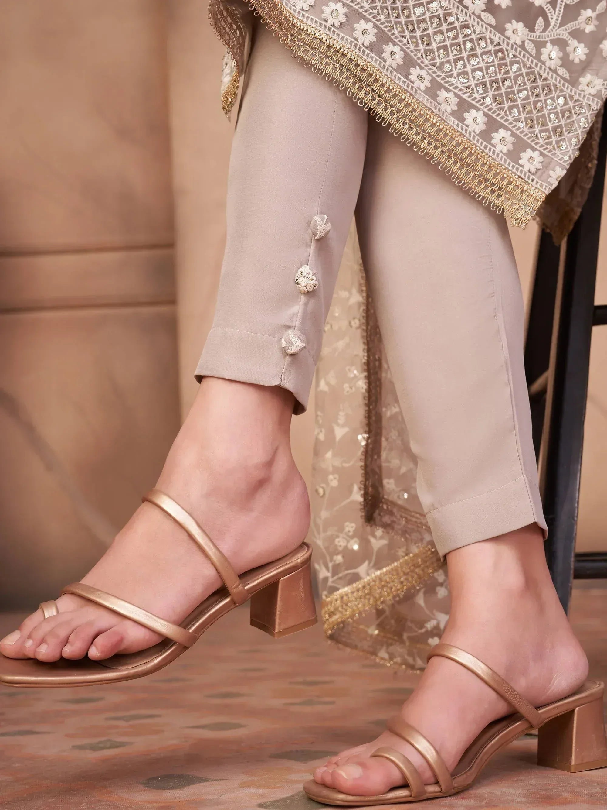 Gold strappy heels with ethnic salwar kameez, floral embroidery and button details
