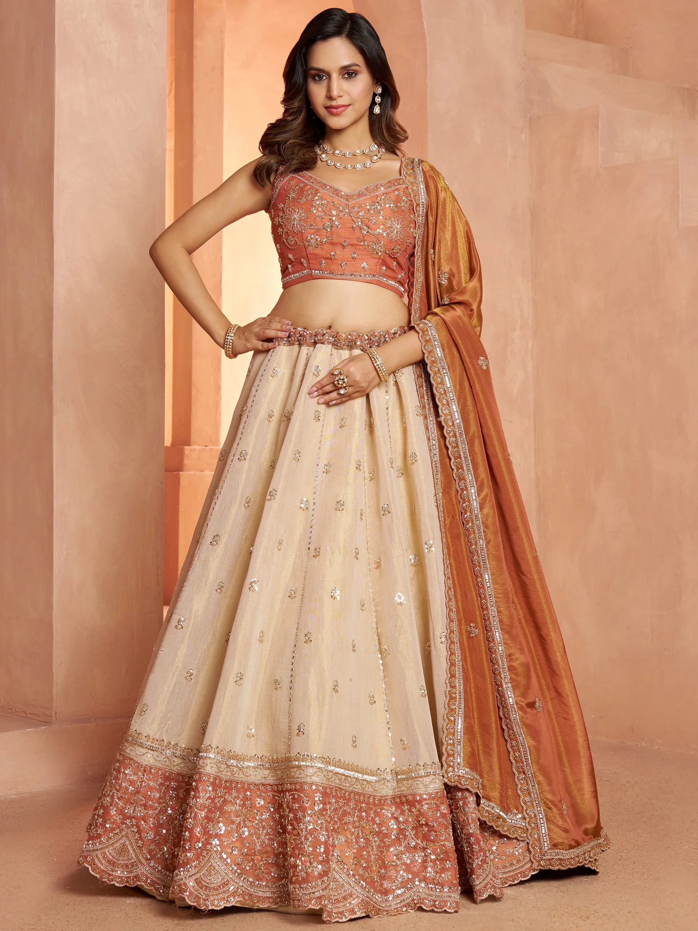 Magnificent Rust Embroidered Tissue Function Wear Lehenga Choli