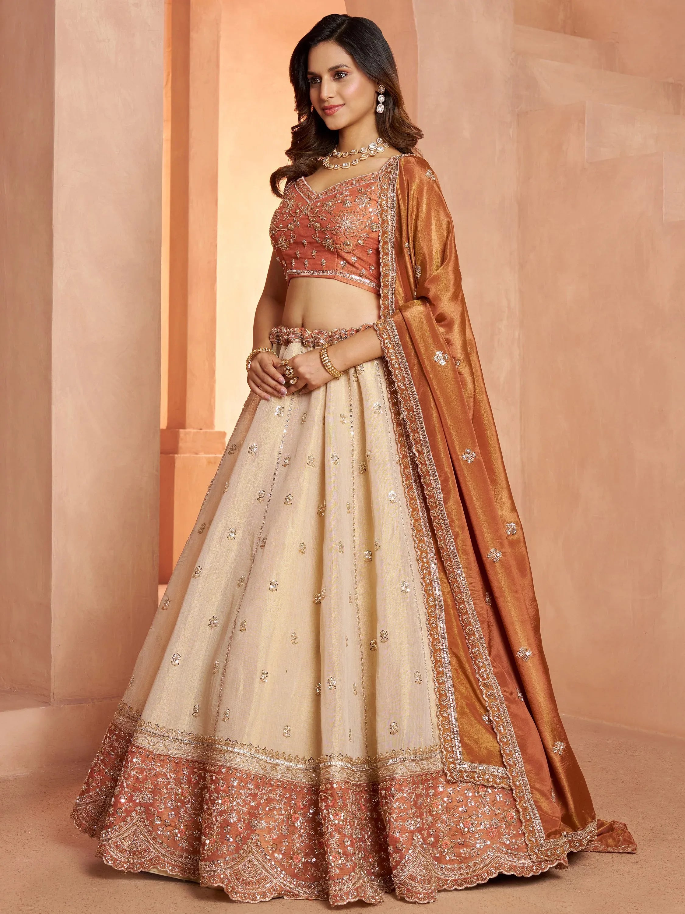 Magnificent Rust Embroidered Tissue Function Wear Lehenga Choli
