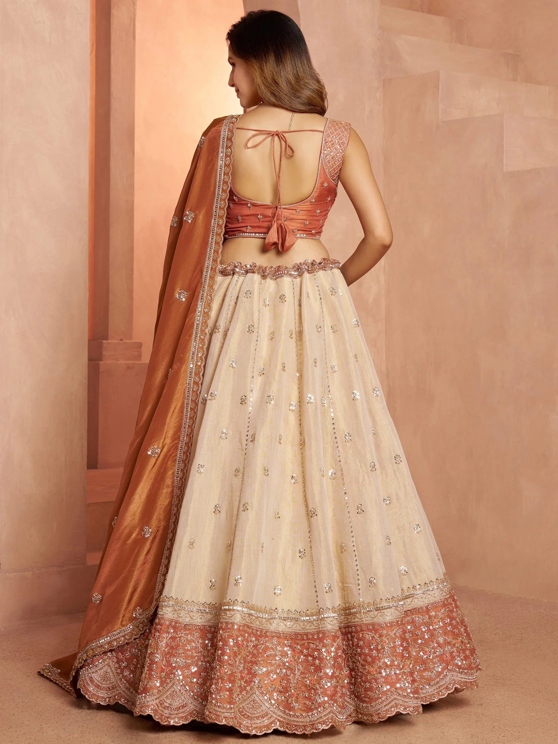 Magnificent Rust Embroidered Tissue Function Wear Lehenga Choli