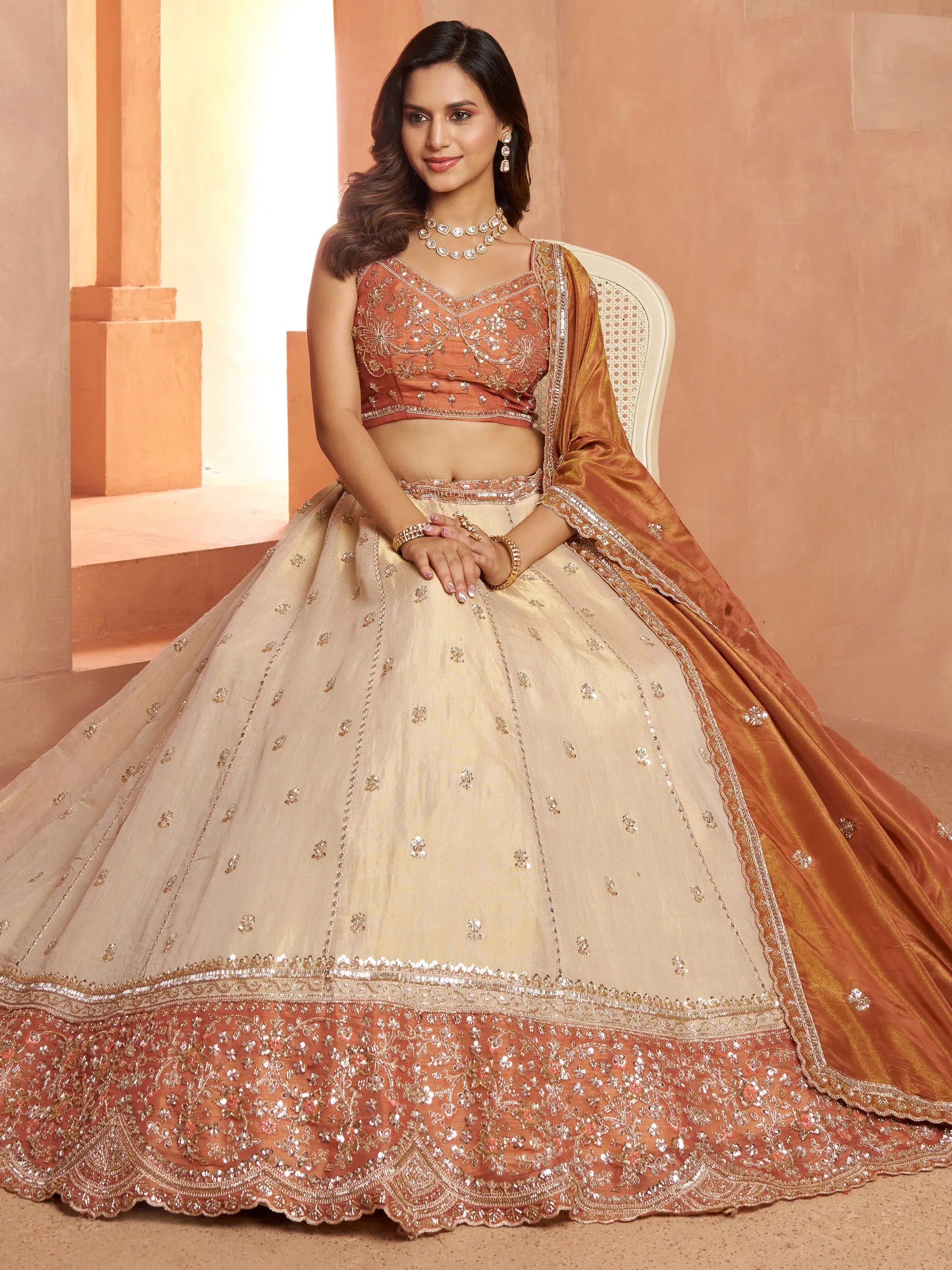 Magnificent Rust Embroidered Tissue Function Wear Lehenga Choli