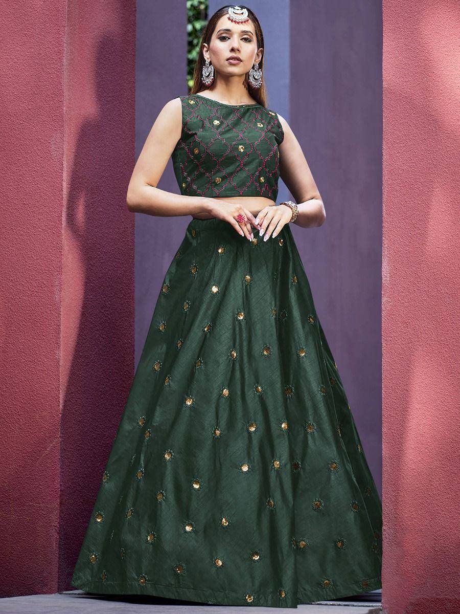 Emerald green embroidered lehenga choli with gold motifs, perfect for Indian ethnic wear occasions