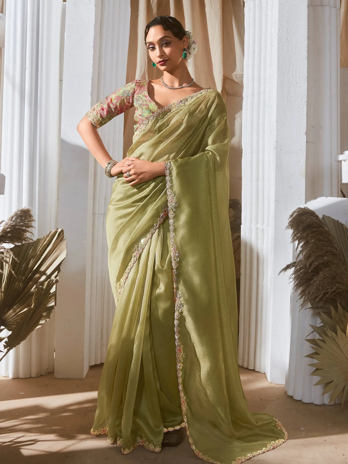 Olive green designer saree with floral blouse and gold embroidery, perfect for Indian ethnic wear occasions