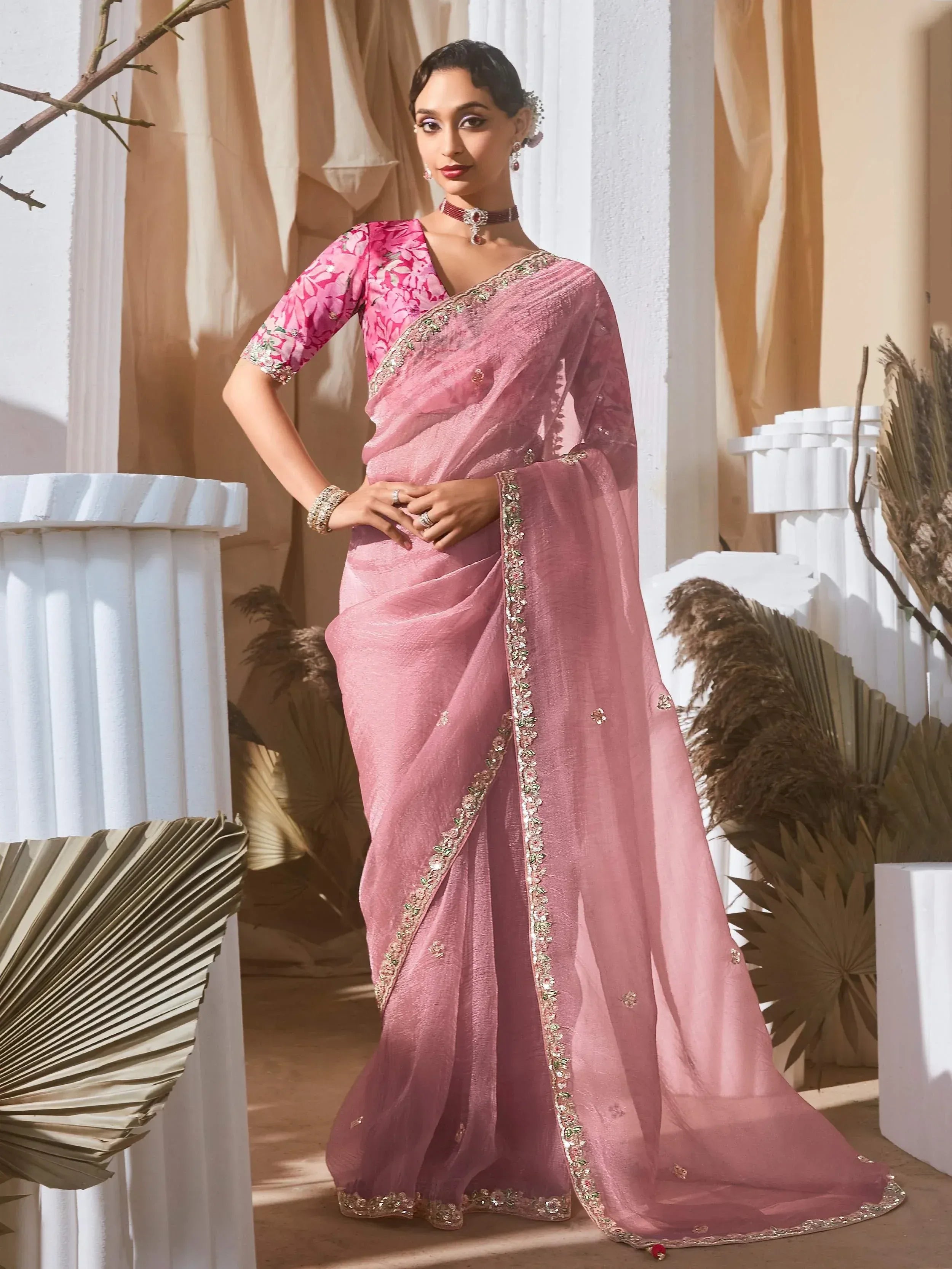 Pink embroidered saree with floral blouse, perfect for Indian ethnic occasions and weddings