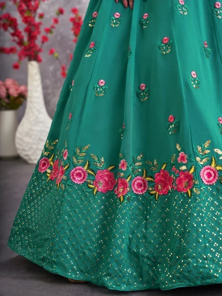 Emerald green lehenga with pink floral embroidery and gold sequin border, Indian ethnic wear