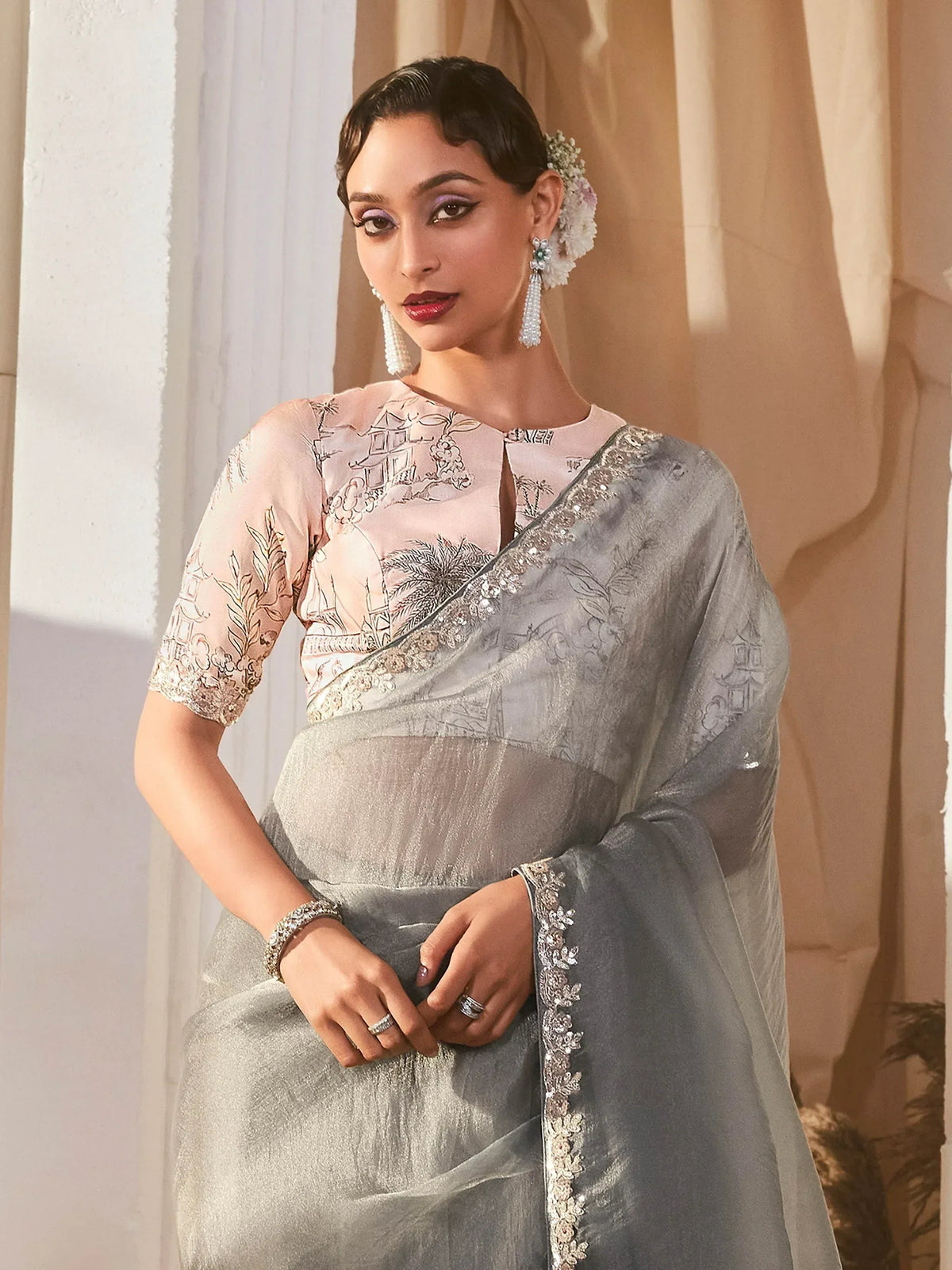 Elegant grey saree with embroidered blouse, perfect for Indian ethnic wear occasions.