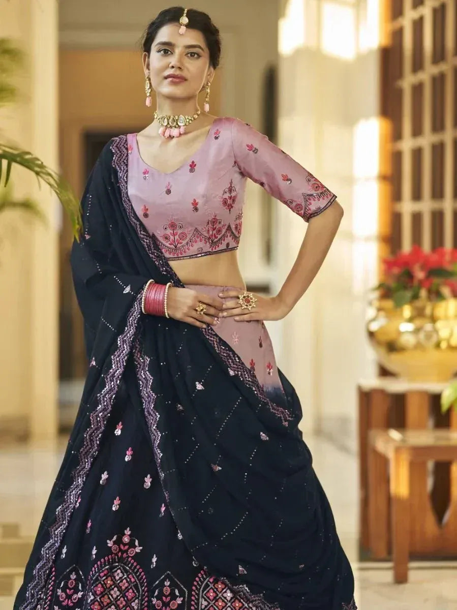 Elegant navy blue and pink embroidered lehenga choli with matching dupatta, perfect for Indian ethnic occasions.