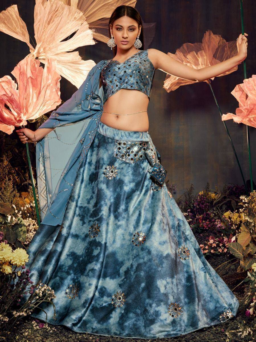 Blue tie-dye lehenga choli with mirror work, perfect for Indian ethnic wear events