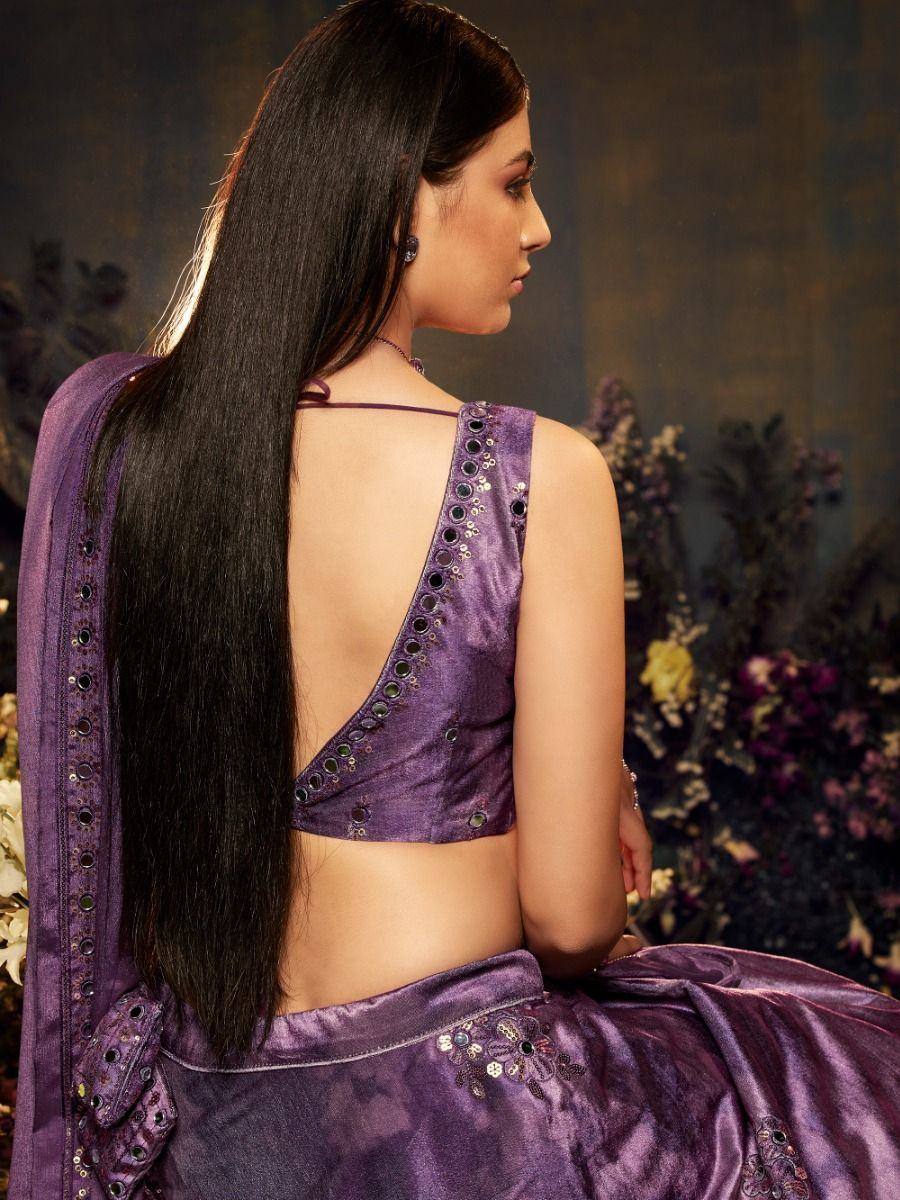 Purple designer lehenga choli with mirror work, backless blouse, and floral embroidery for Indian ethnic wear