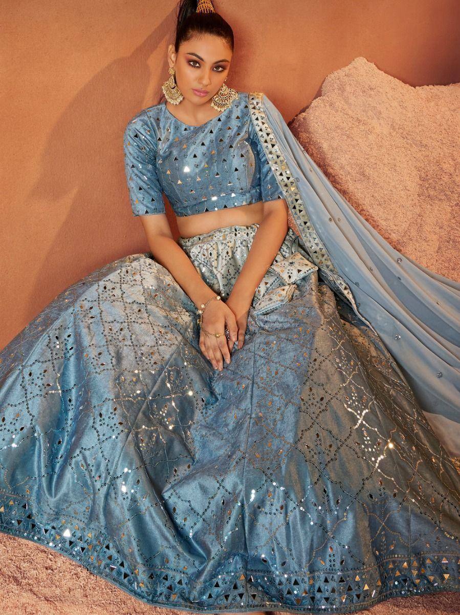 Blue designer lehenga choli with mirror work and sequins, ethnic Indian wear for weddings