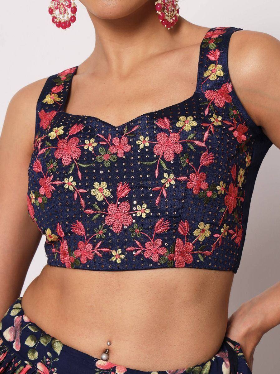 Navy blue floral embroidered blouse with pink and yellow flowers, paired with matching lehenga, ideal for Indian ethnic wear.