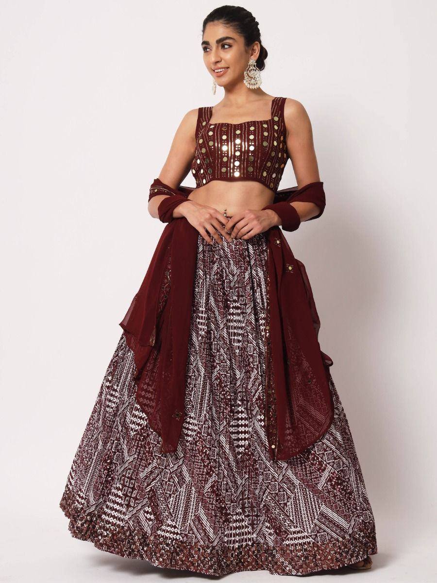 Maroon designer lehenga choli with mirror work and geometric print, perfect for Indian ethnic wear occasions