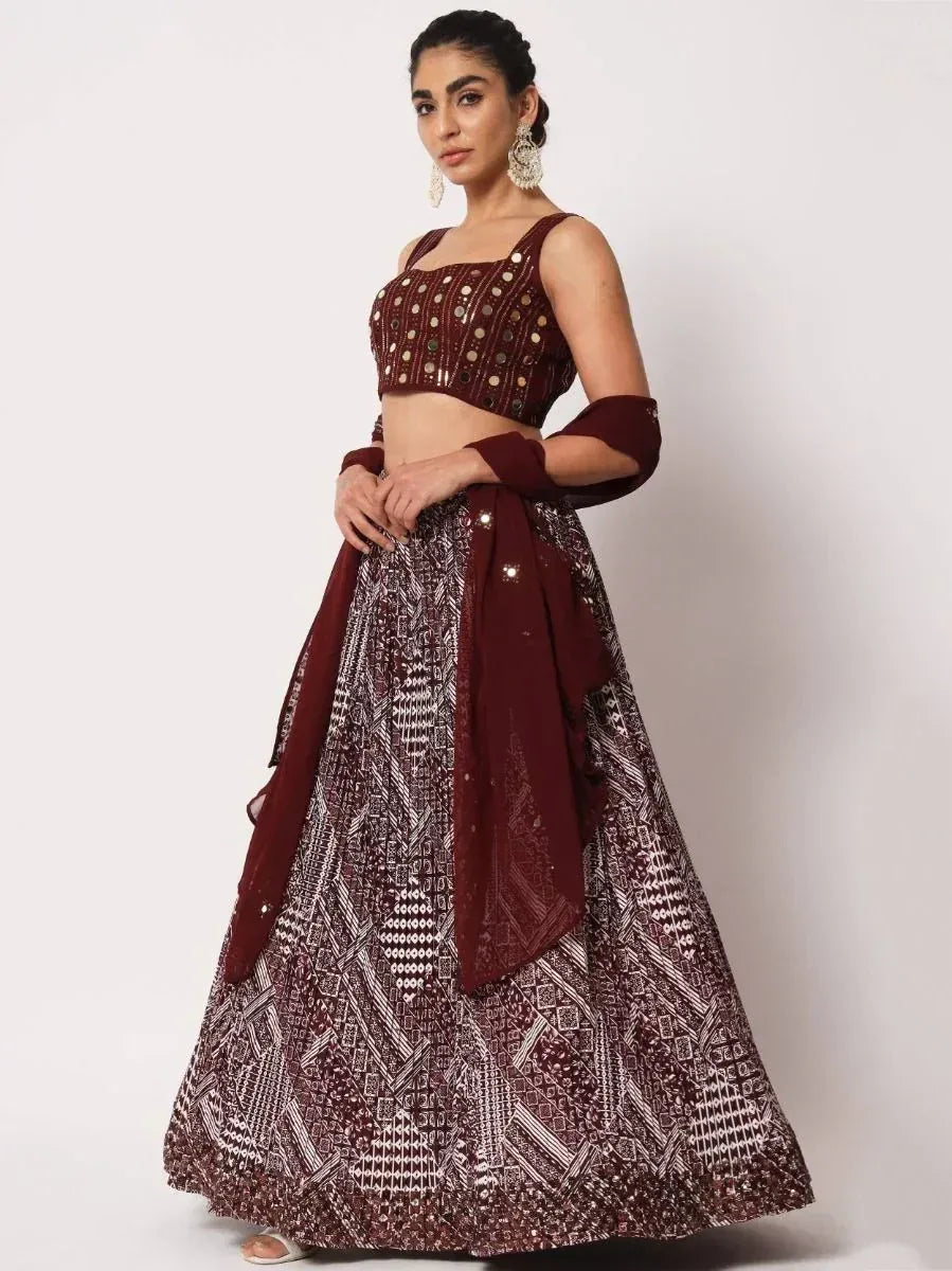 Maroon designer lehenga choli with mirror work and geometric print, perfect for Indian ethnic occasions