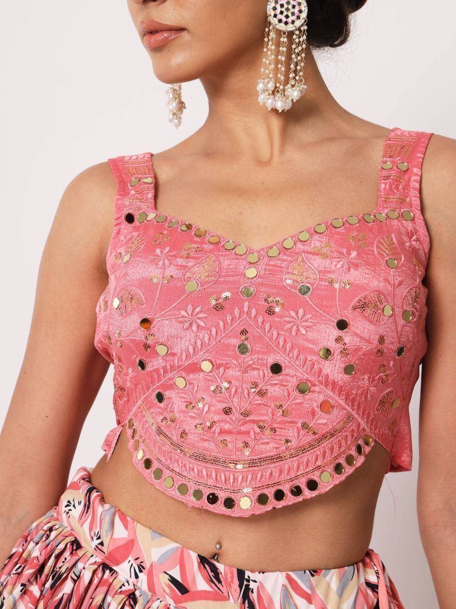 Pink embroidered crop top with mirror work, paired with printed skirt, ideal for Indian ethnic wear