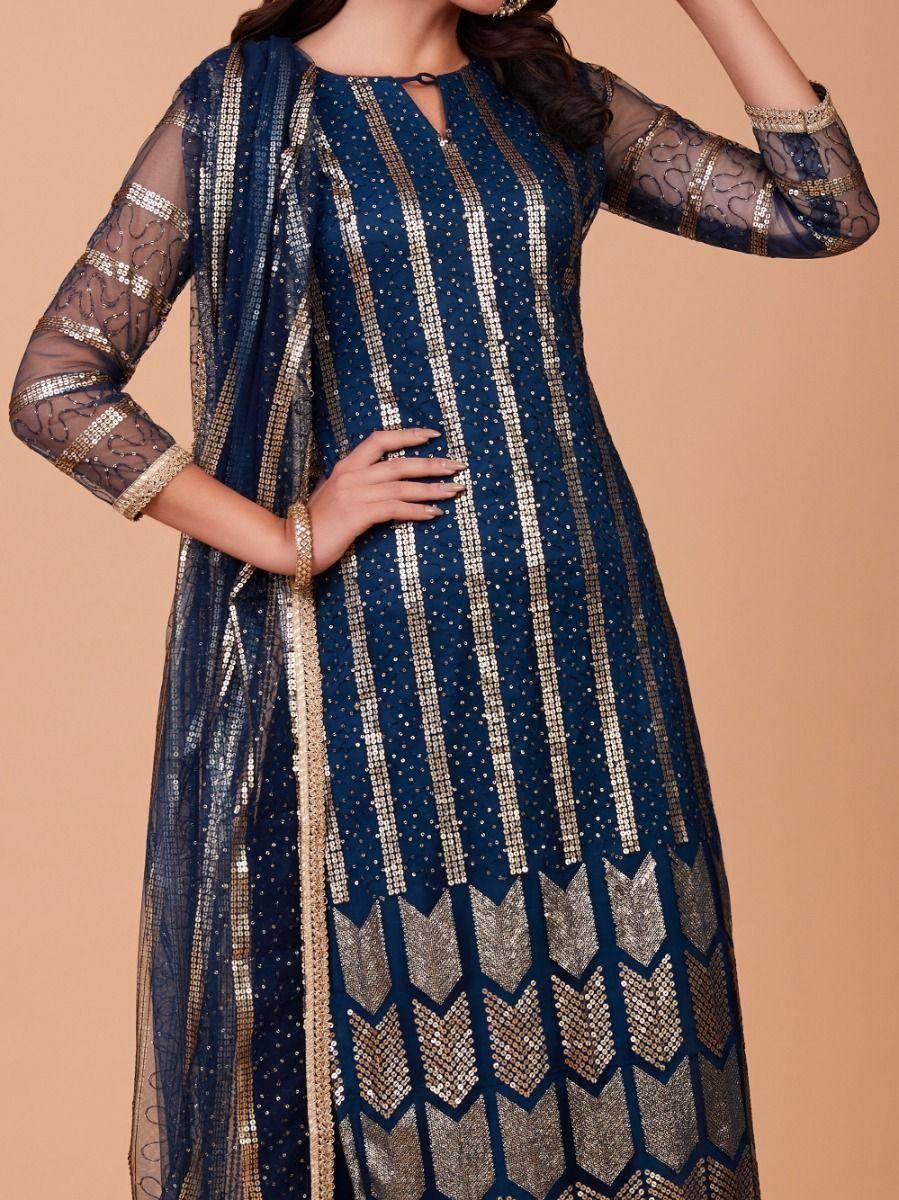 Navy blue ethnic gown with gold sequin stripes and sheer sleeves, perfect for festive occasions.