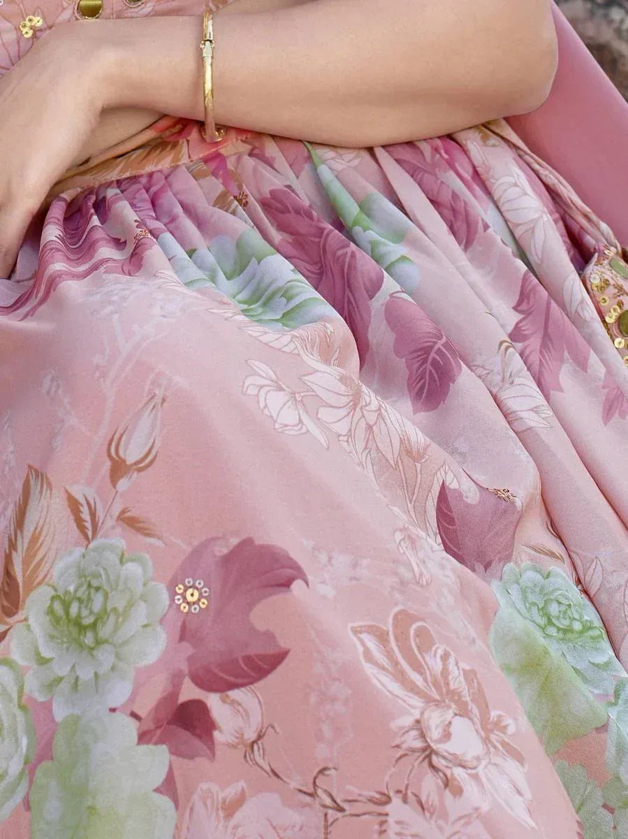 Pink floral print ethnic gown with gold embellishments, perfect for Indian occasions