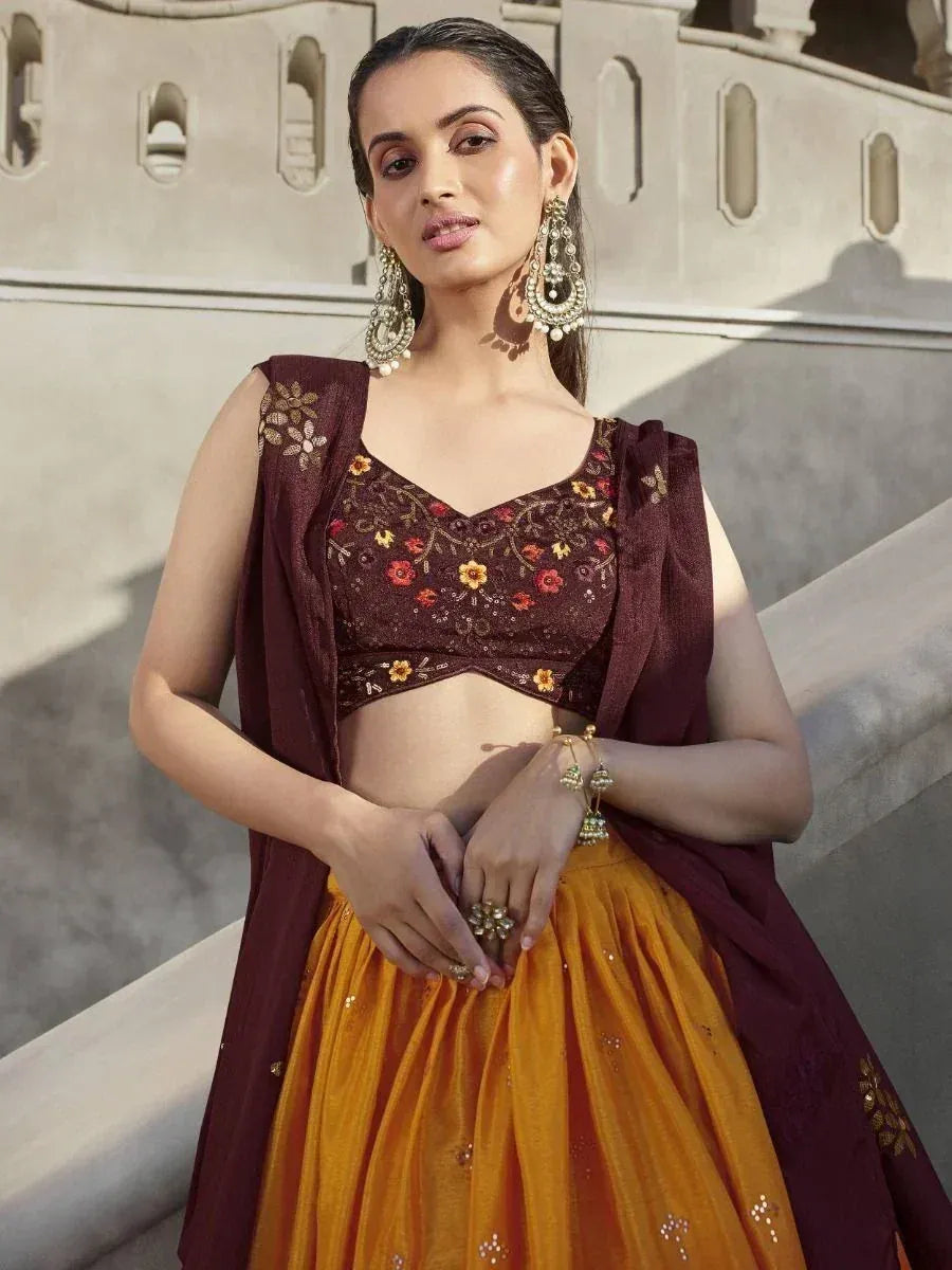 Maroon floral embroidered lehenga choli with mustard skirt, perfect for Indian ethnic occasions