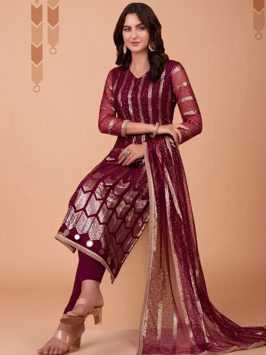 Maroon designer salwar kameez with gold embroidery and sheer dupatta, ethnic Indian wear