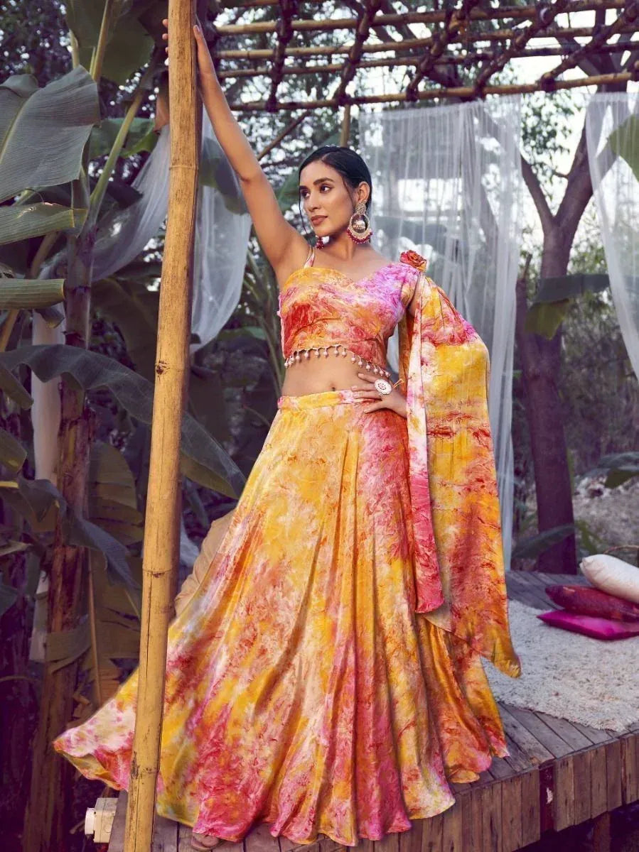 Vibrant tie-dye lehenga choli with floral print, perfect for Indian ethnic wear occasions