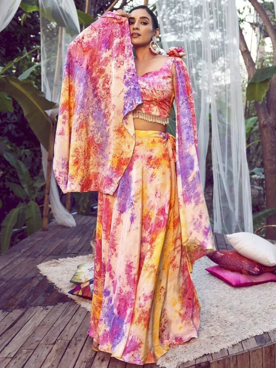 Vibrant tie-dye lehenga choli with floral print, perfect for Indian ethnic wear occasions
