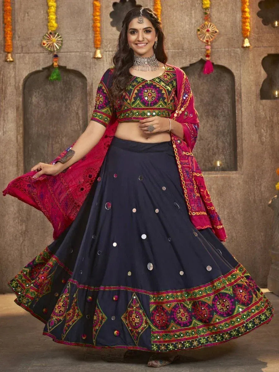 Navratri lehenga choli with mirror work, embroidered blouse, and dupatta for Indian ethnic wear