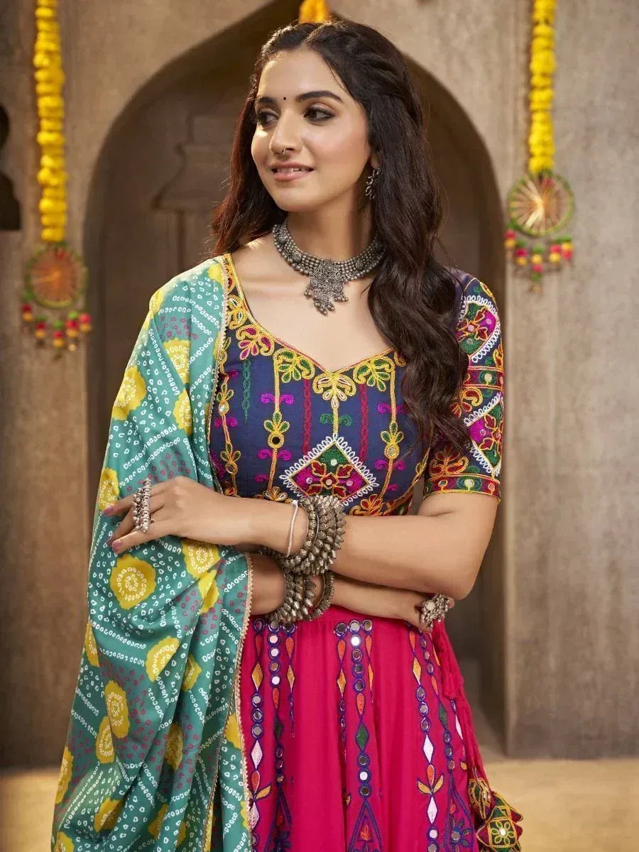 Woman in colorful embroidered lehenga choli with dupatta, traditional Indian ethnic wear