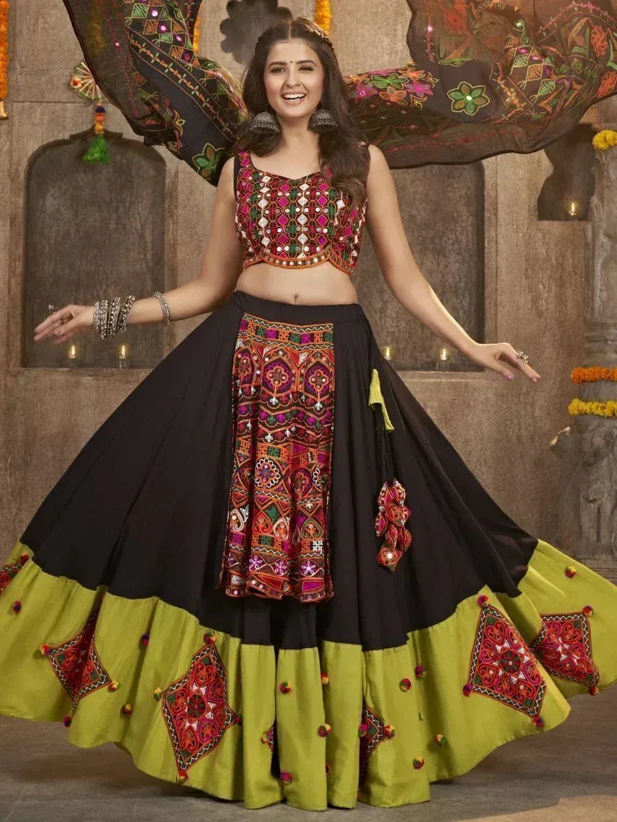 Black and green embroidered lehenga choli with mirror work, perfect for Indian ethnic occasions.