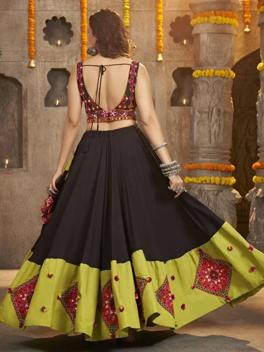 Black and lime green embroidered lehenga choli with back tie, perfect for Indian ethnic wear occasions.