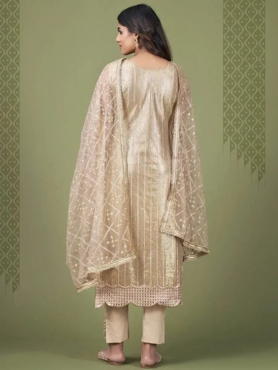 Elegant gold embroidered salwar kameez with sheer dupatta, perfect for Indian ethnic occasions