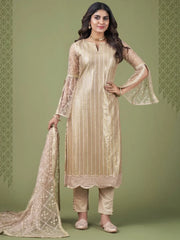Woman in gold embroidered salwar kameez with matching dupatta from Ethnic Plus