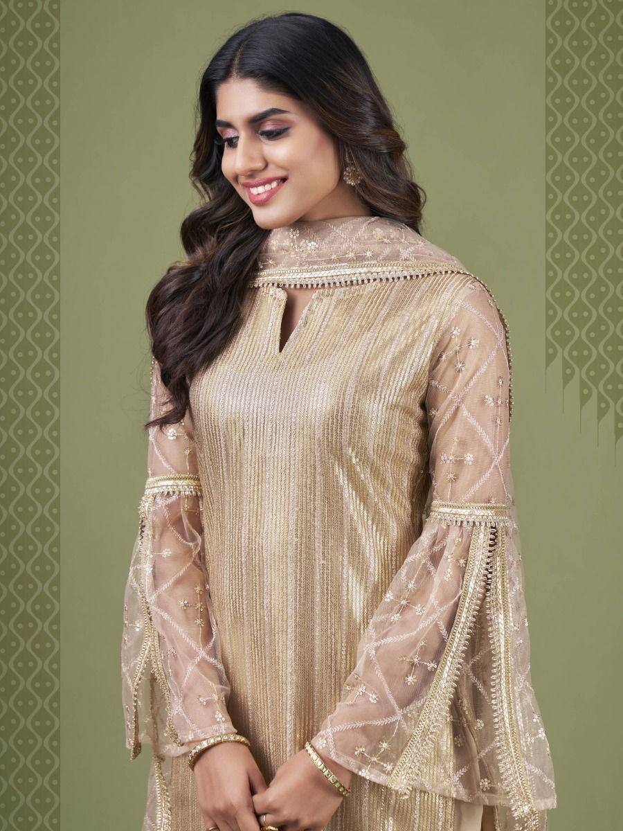 Elegant gold embroidered ethnic gown with sheer bell sleeves, perfect for Indian festive occasions