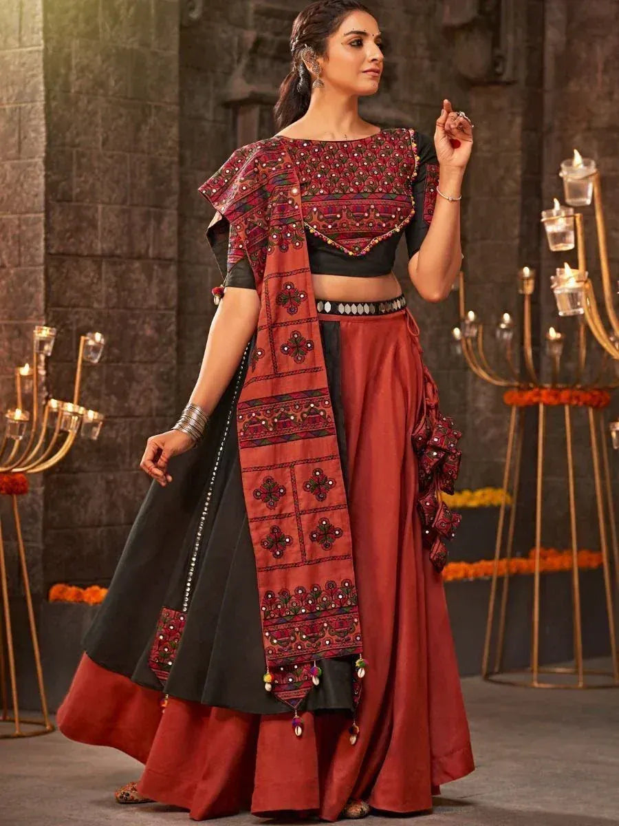 Ethnic lehenga choli with mirror work and embroidered dupatta, perfect for Indian weddings and festive occasions