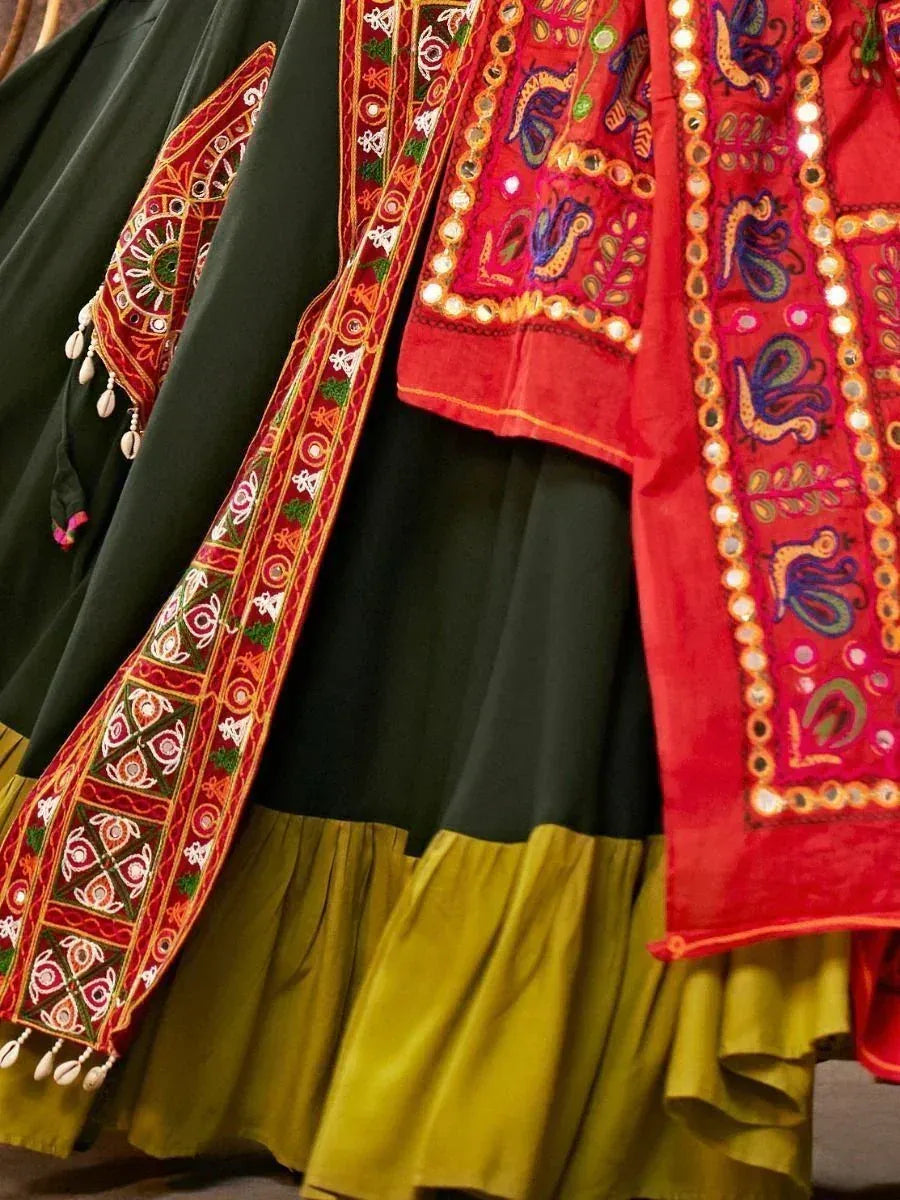 Vibrant Indian ethnic wear with mirror work, embroidery, and colorful borders on lehenga and blouse