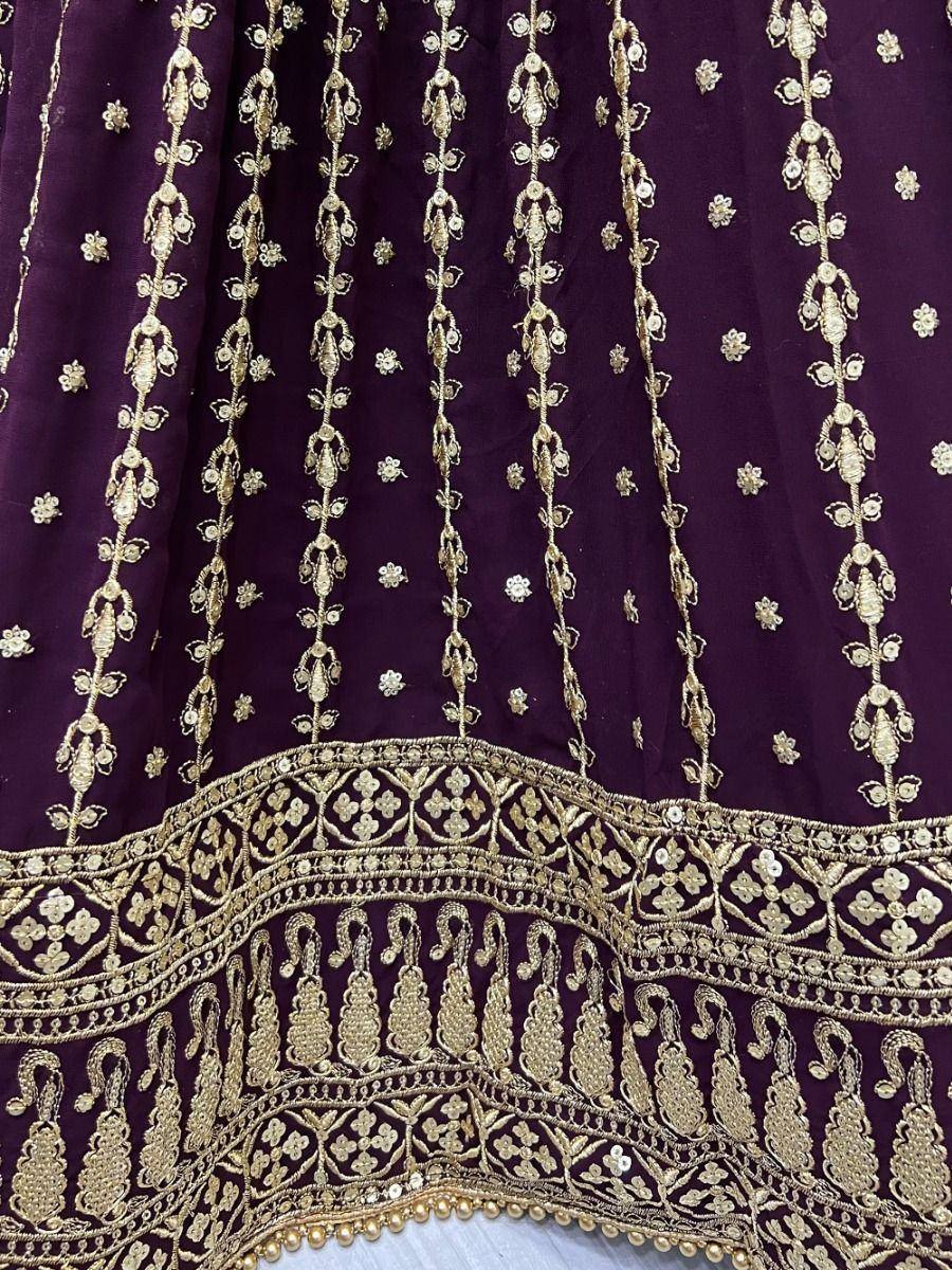 Purple lehenga with gold embroidery and floral motifs, ethnic Indian wear