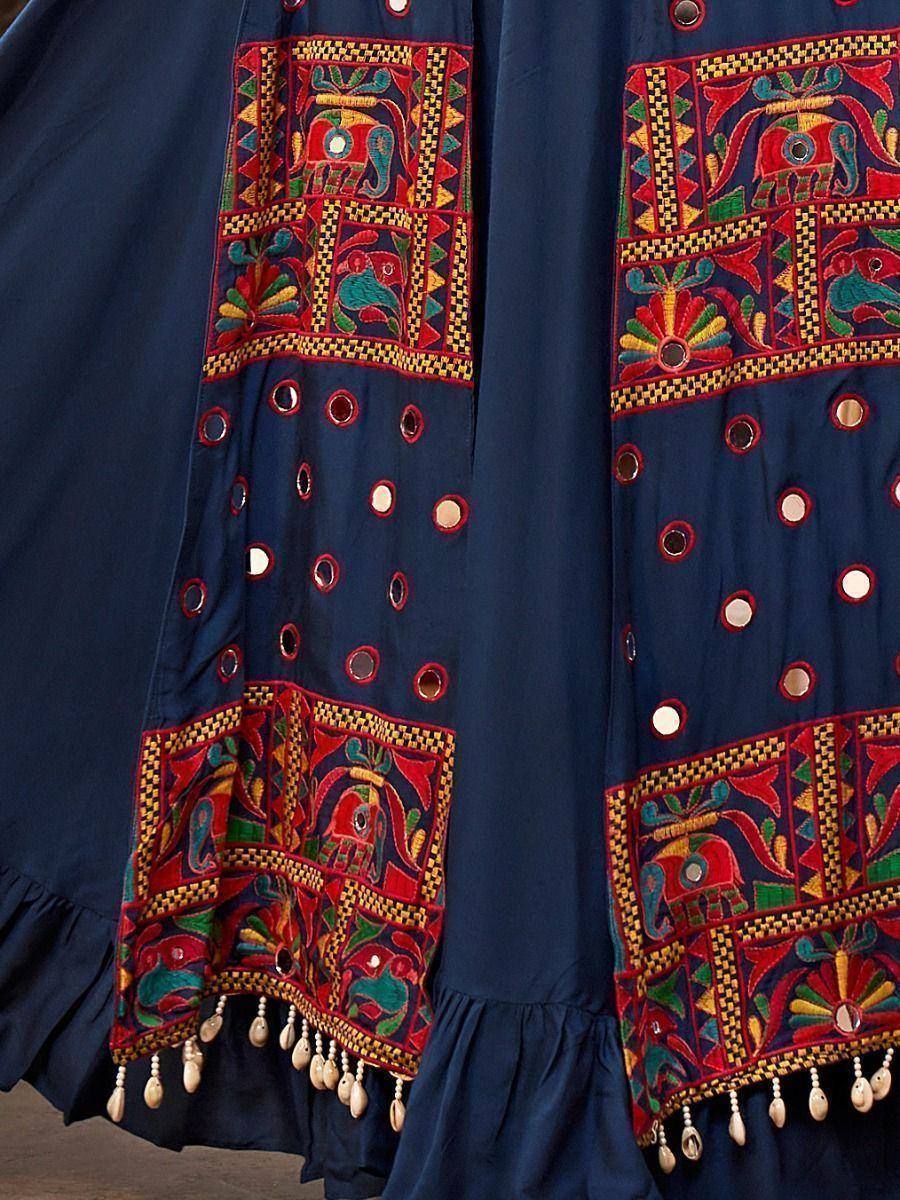Navy blue ethnic gown with vibrant elephant embroidery, mirror work, and tassels for festive occasions