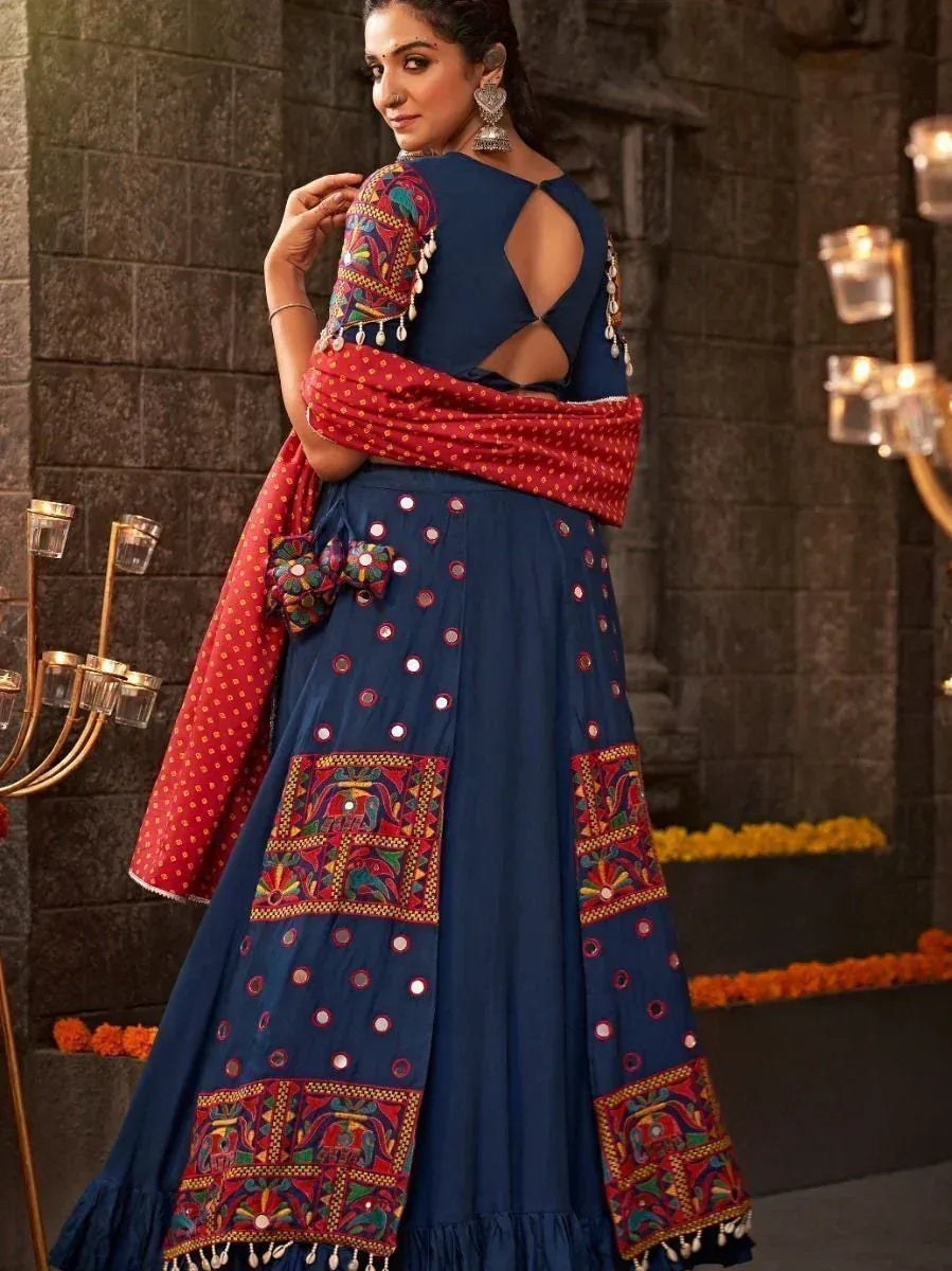 Blue embroidered lehenga choli with mirror work and red dupatta, ethnic Indian wear for festive occasions