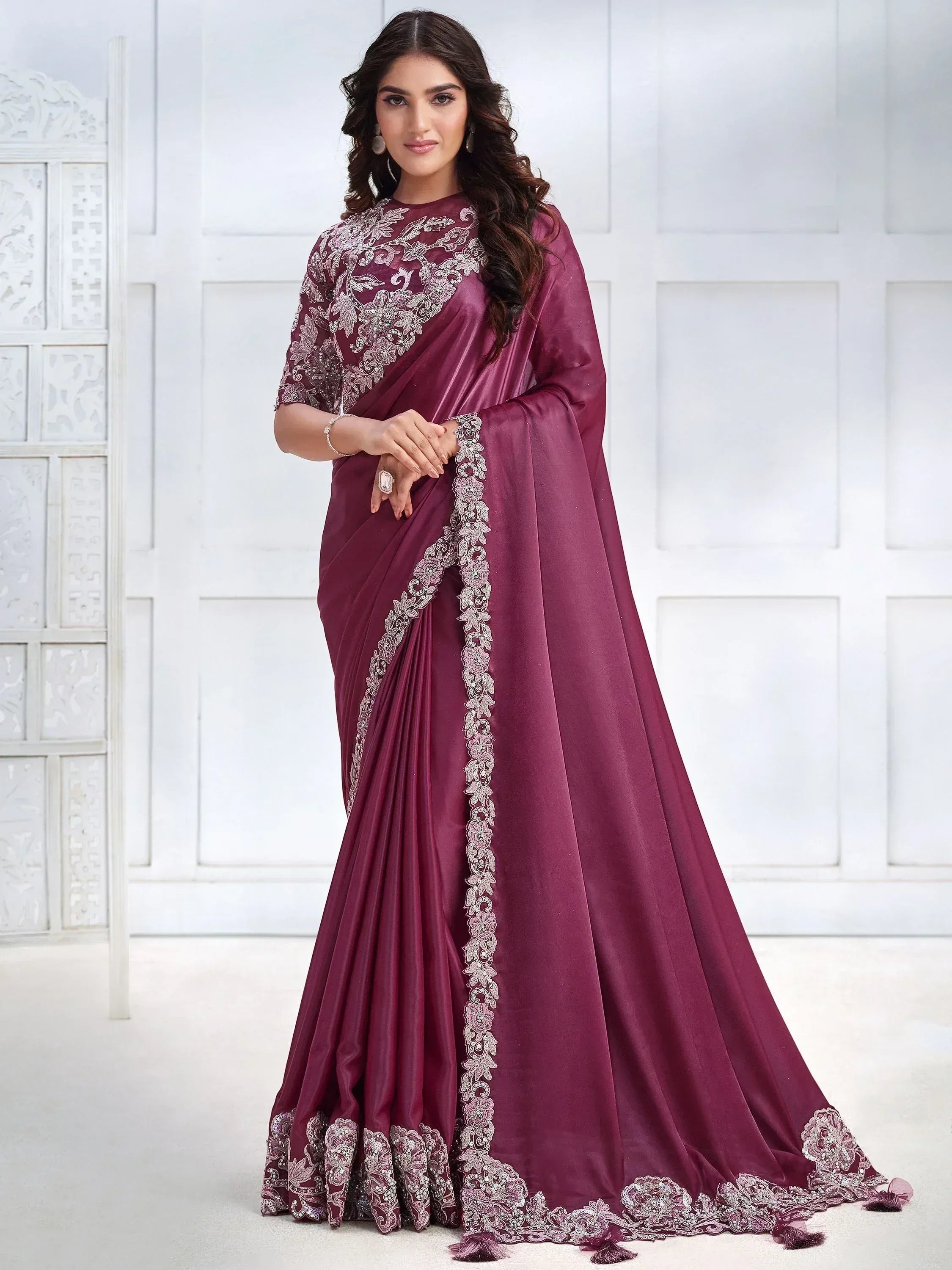 Elegant maroon saree with silver floral embroidery, perfect for Indian ethnic occasions and weddings