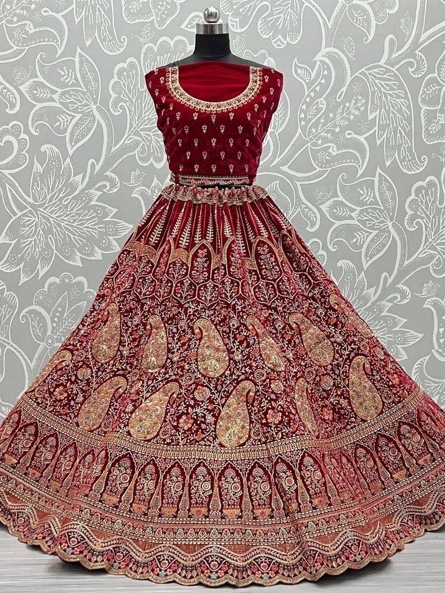 Red velvet lehenga choli with gold paisley embroidery, Indian ethnic wear for weddings and festivals