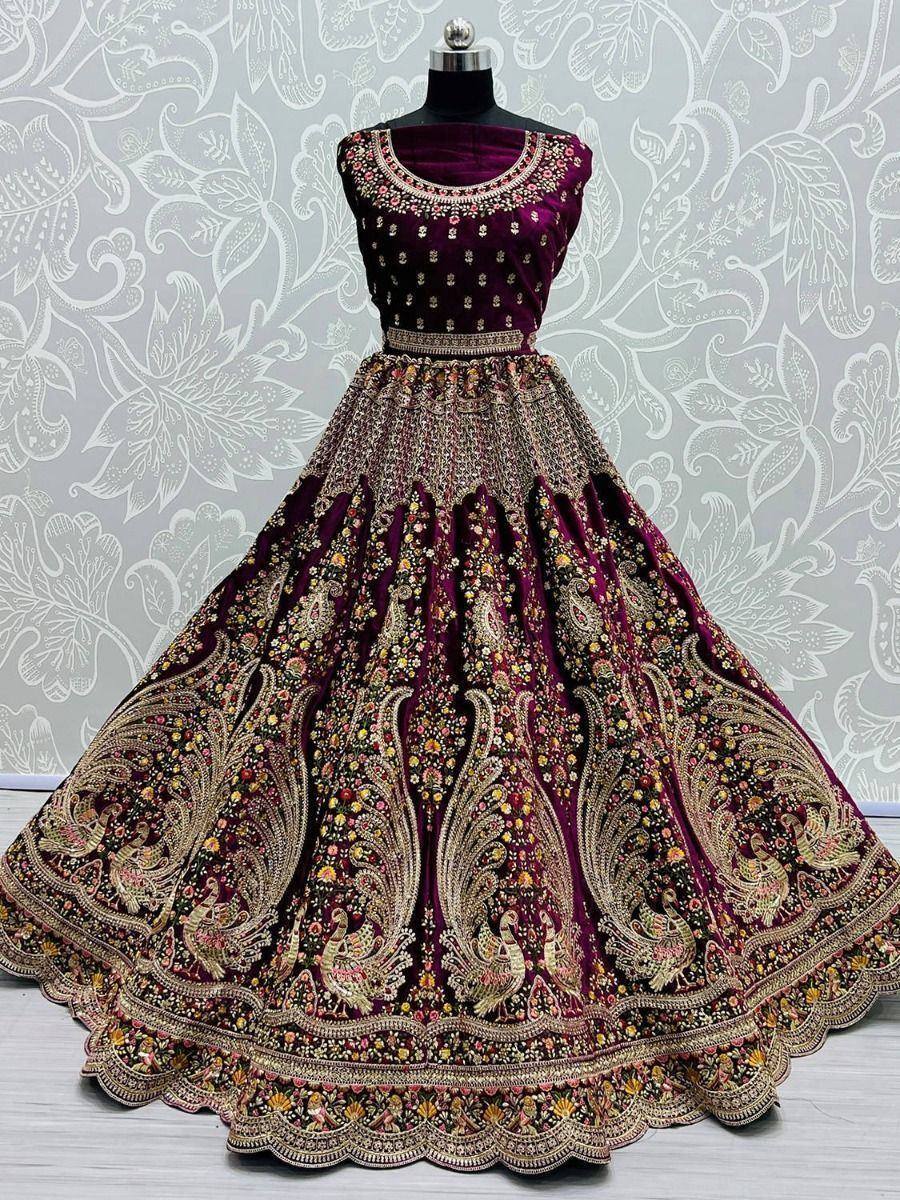 Purple velvet lehenga choli with peacock embroidery, perfect for Indian weddings and festive occasions