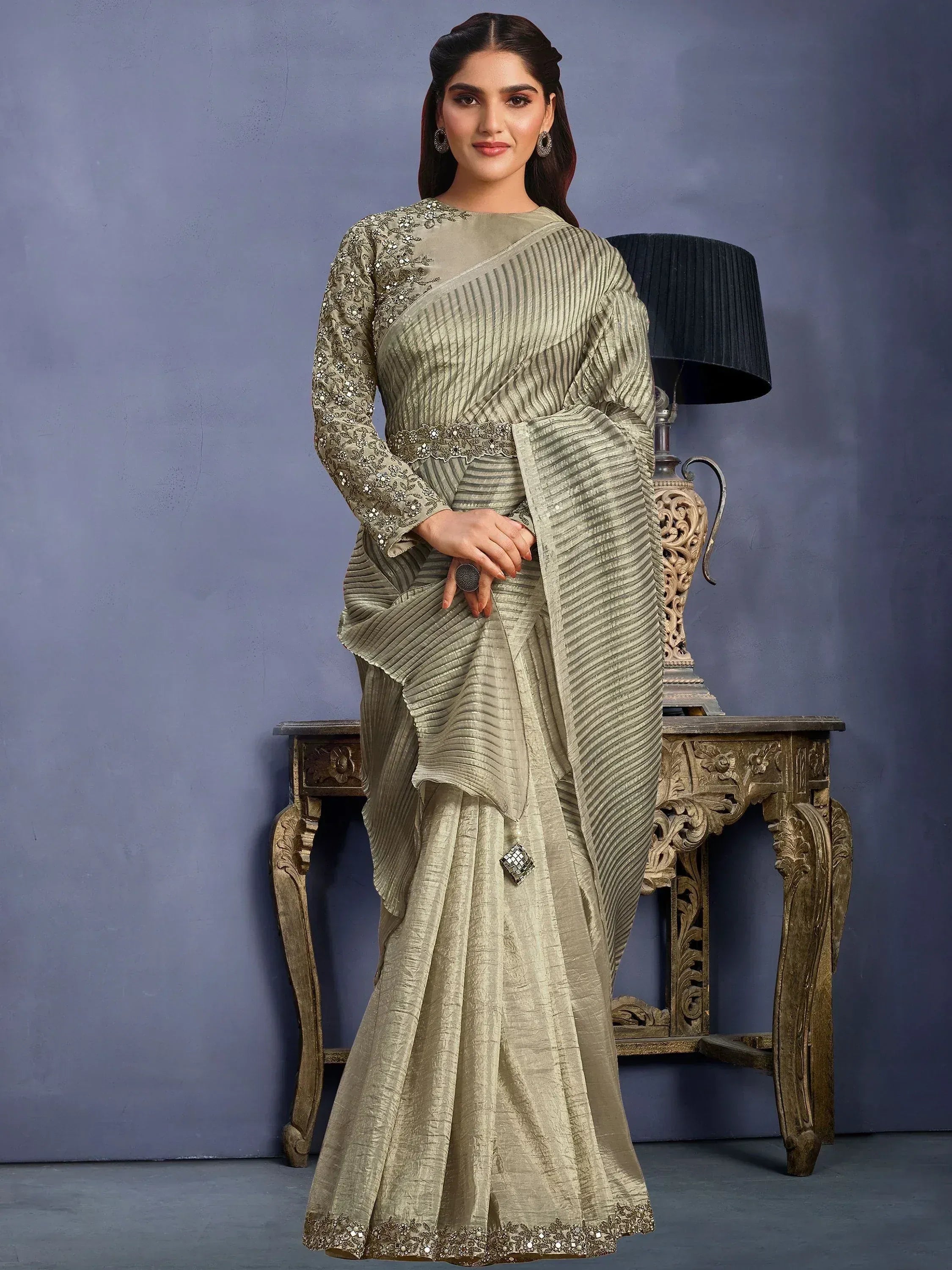 Elegant olive green pleated saree with embroidered blouse, perfect for Indian ethnic occasions