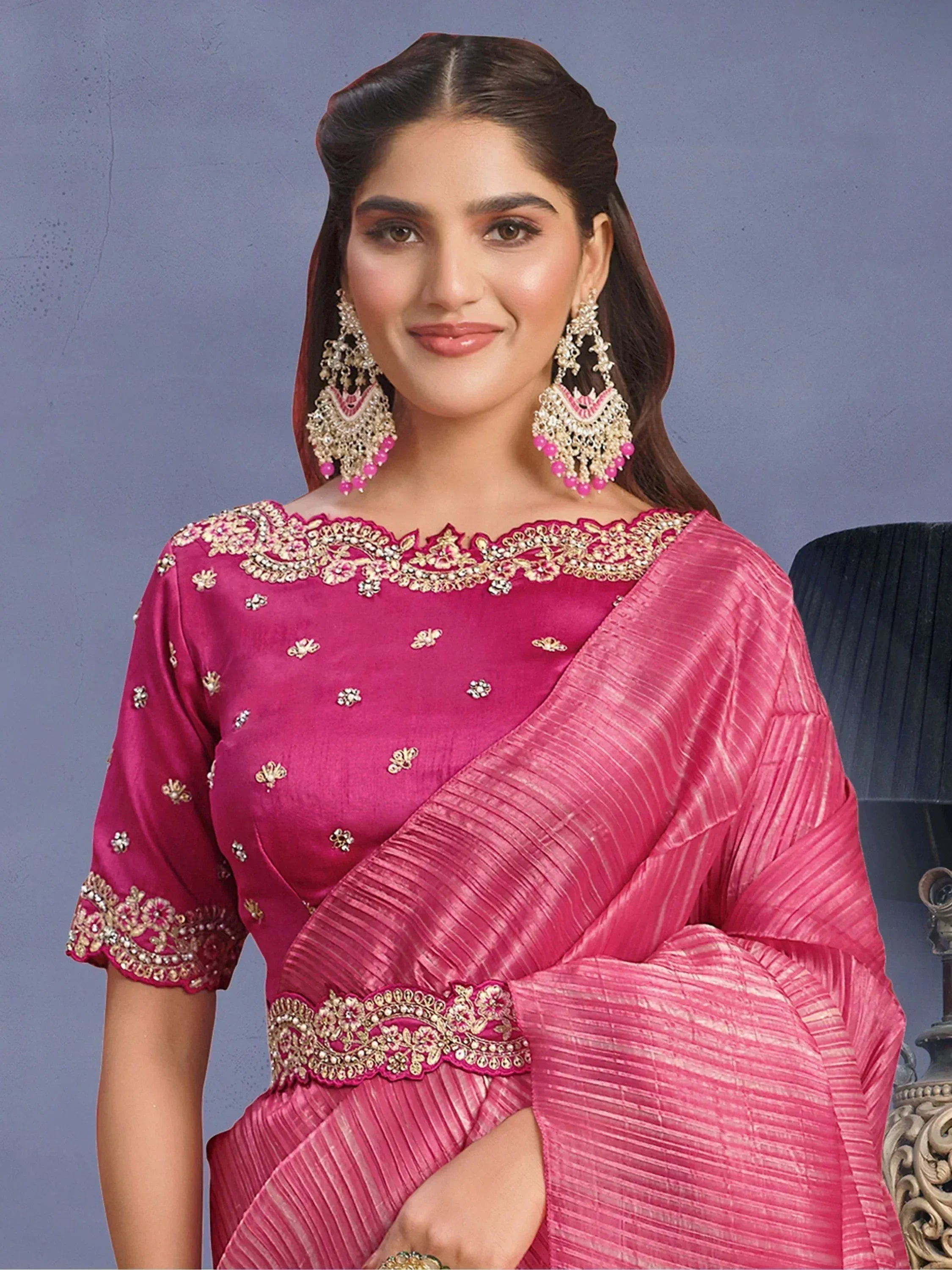 Pink embroidered saree with gold detailing, perfect for Indian ethnic wear occasions