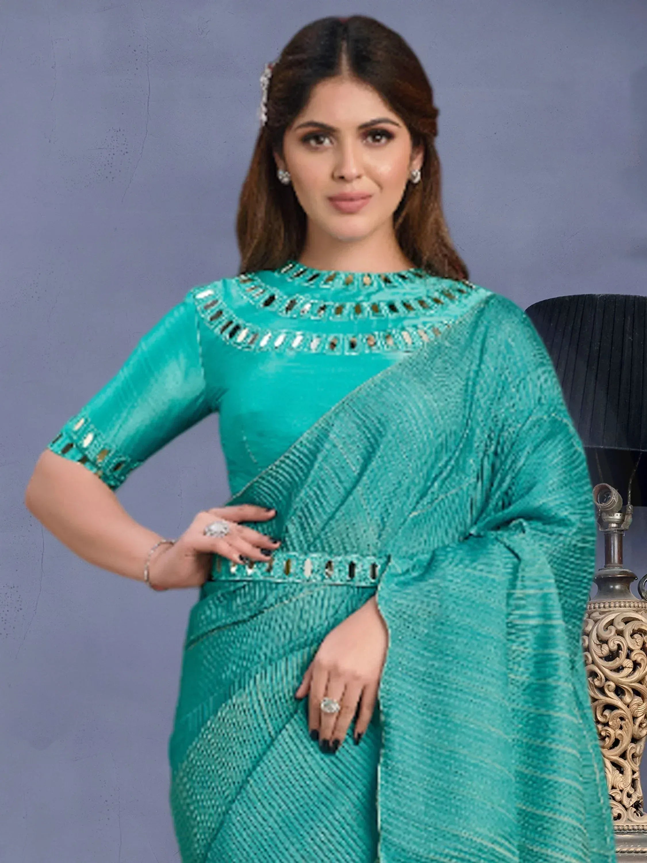 Teal designer saree with mirror work and textured weave, perfect for Indian ethnic occasions