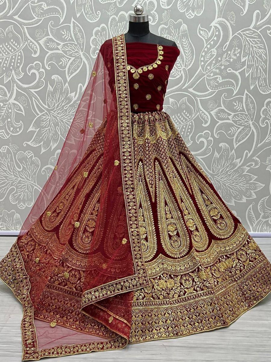 Maroon velvet lehenga choli with gold embroidery, designer Indian ethnic wear for weddings