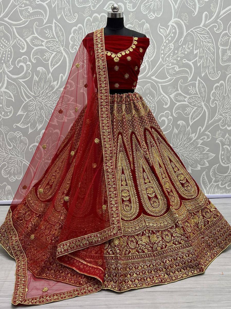 Red velvet lehenga choli with gold embroidery, designer Indian ethnic wear for weddings