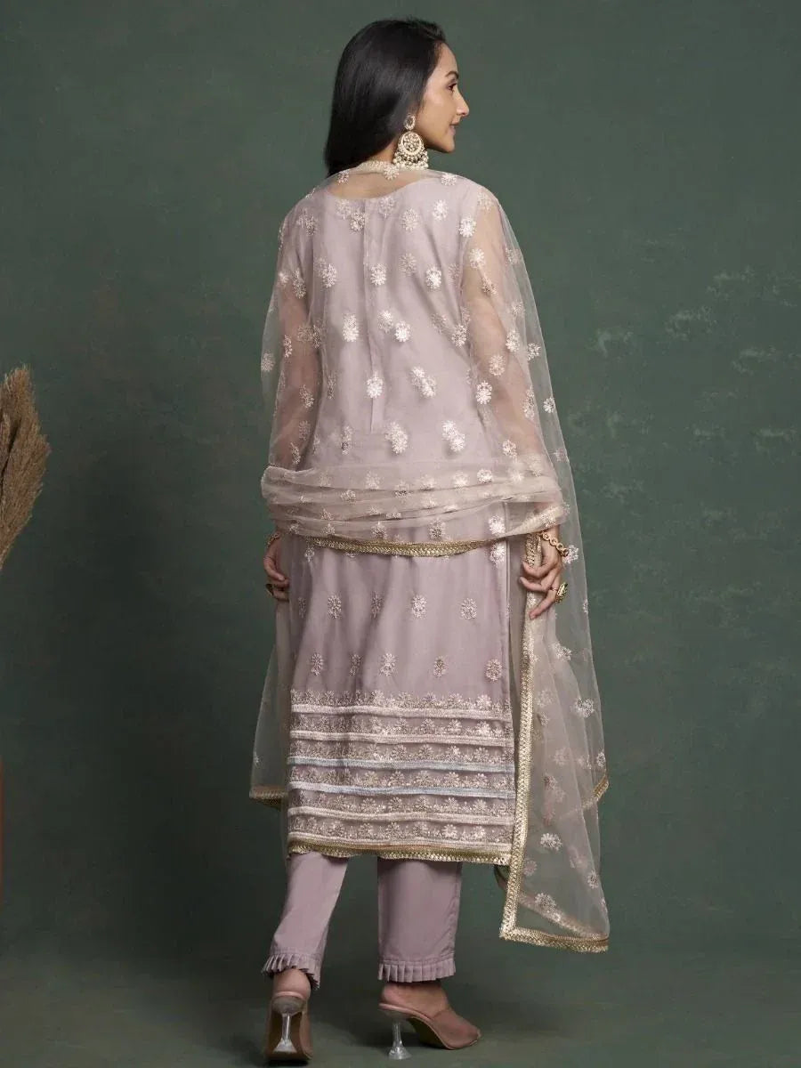 Elegant mauve salwar kameez with floral embroidery and sheer dupatta, perfect for ethnic occasions.