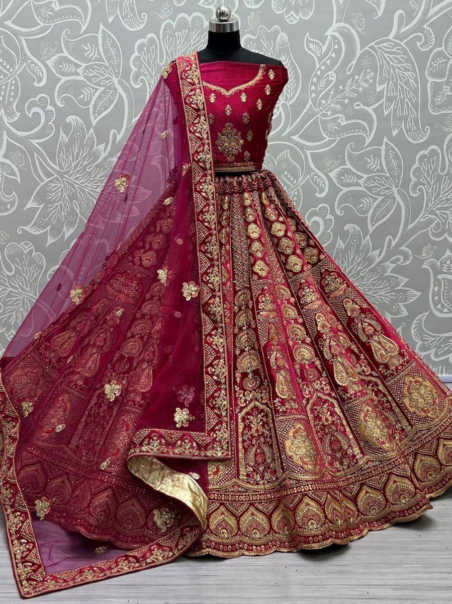 Maroon designer lehenga choli with gold embroidery and sheer dupatta, ethnic wear for weddings
