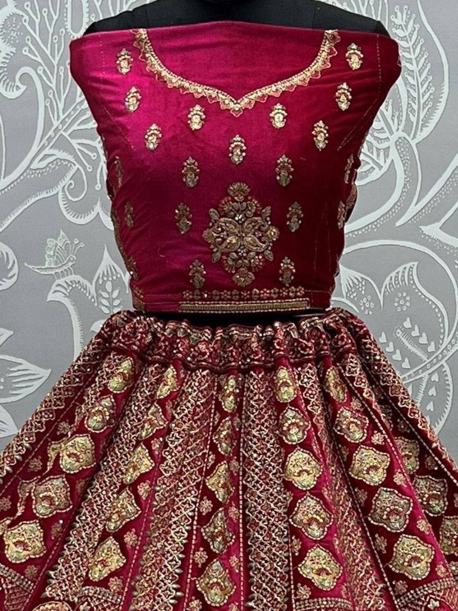 Maroon velvet lehenga choli with gold embroidery, designer ethnic wear for weddings